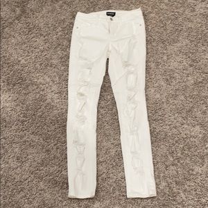 Bebe ripped white jeans